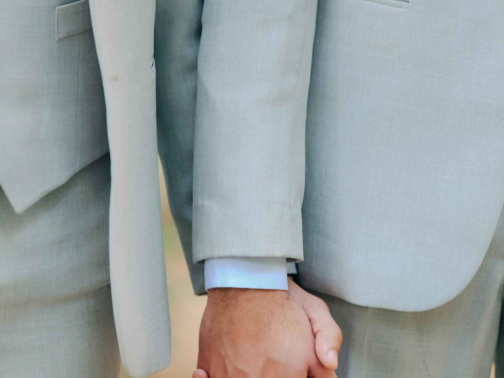 Couple holding hands